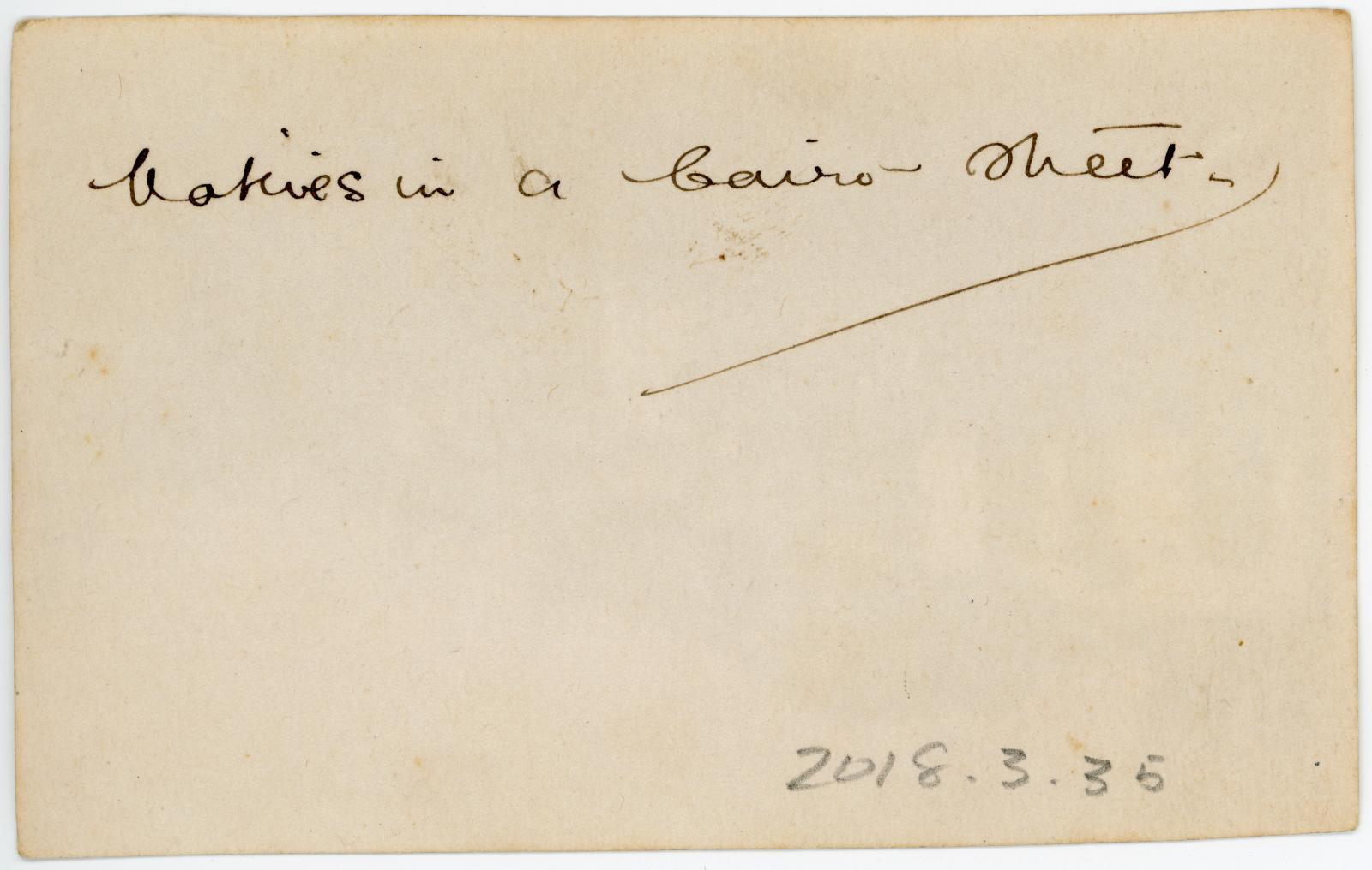 Rear view showing inscription.