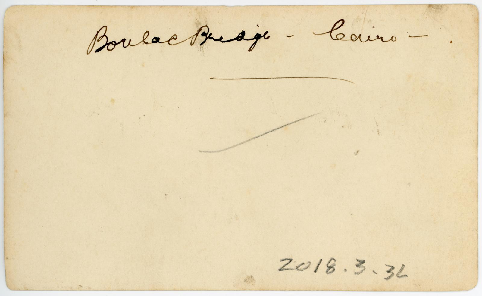 Rear view showing inscription.