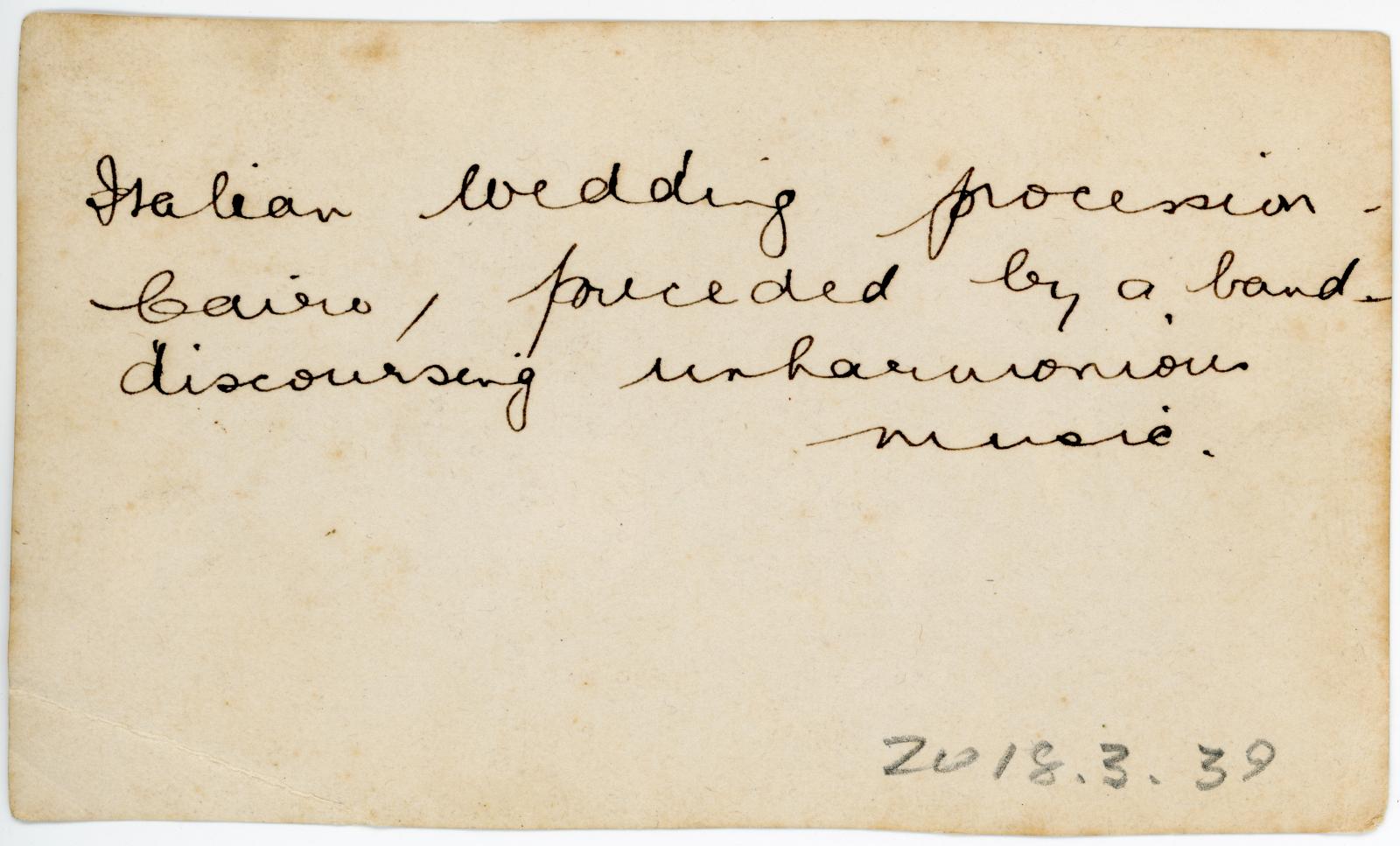 Rear view showing inscription.
