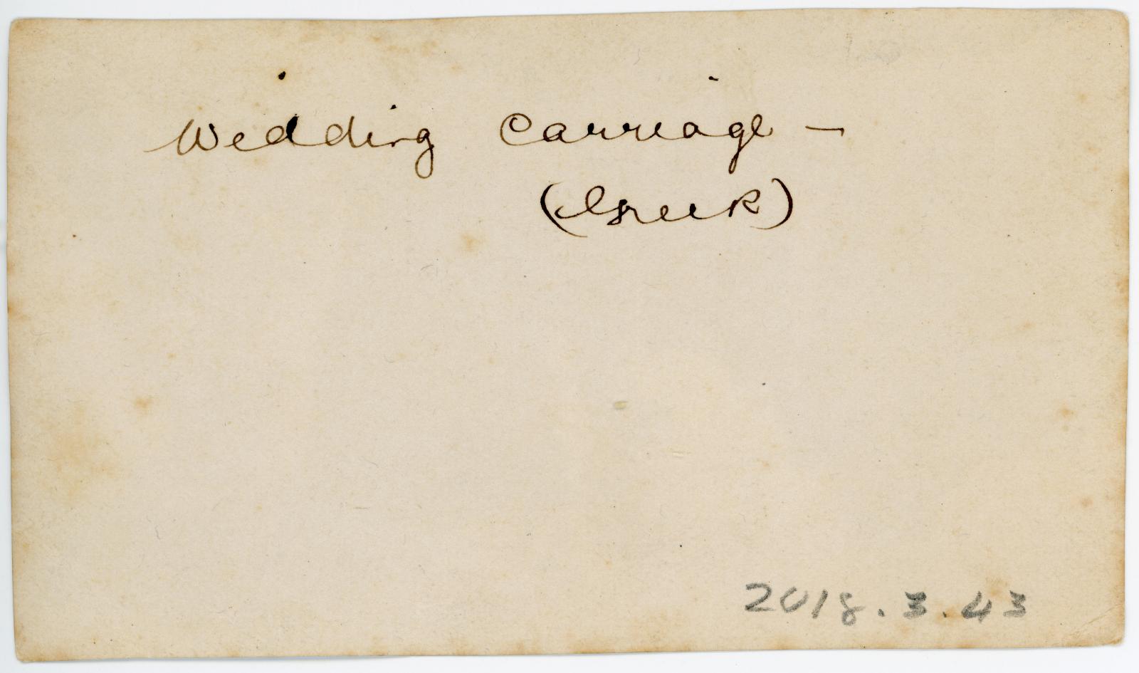Rear view showing inscription.