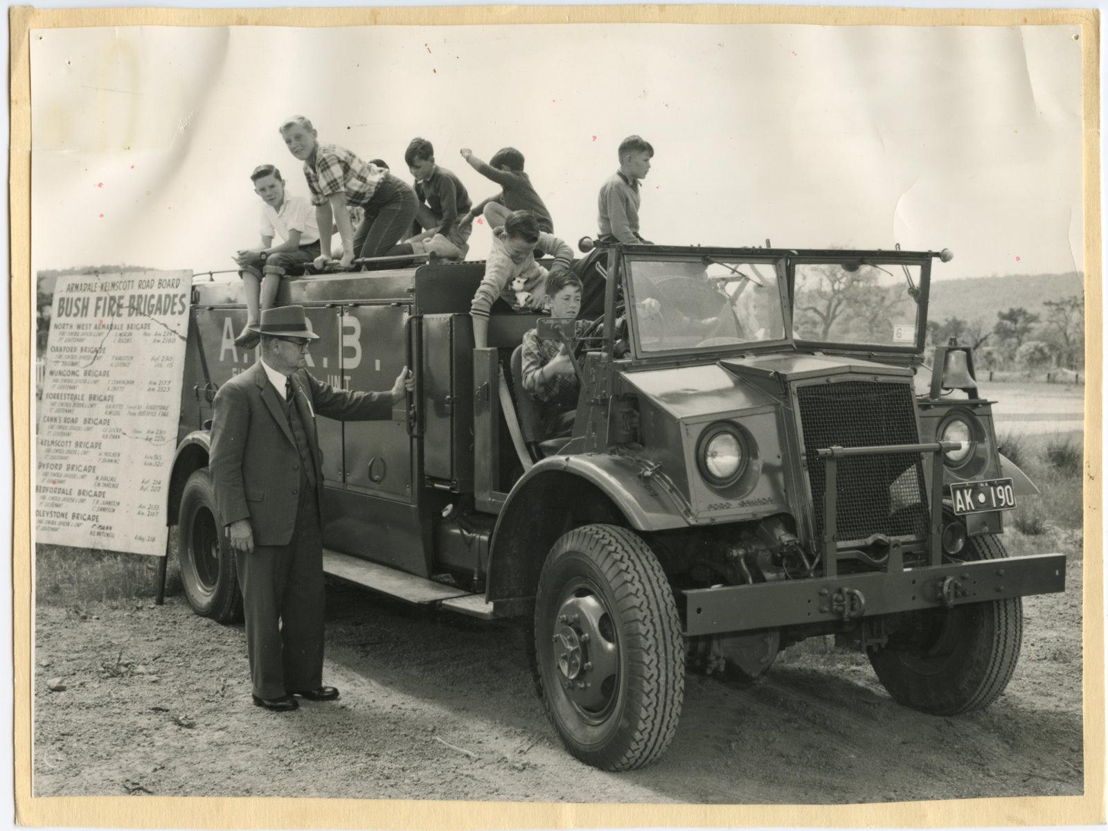 The Armadale Kelmscott Road Board firefighting unit being used to promote the local volunteer bush fire brigades, 1960.