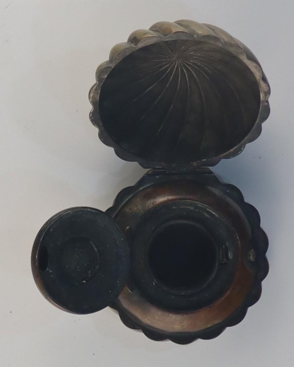 Top view of fully open Inkwell