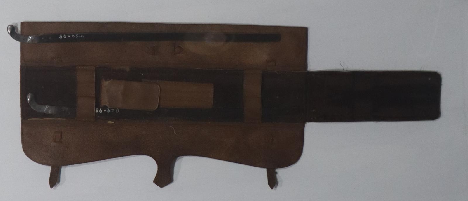 Open Leather Case showing Castration Knives