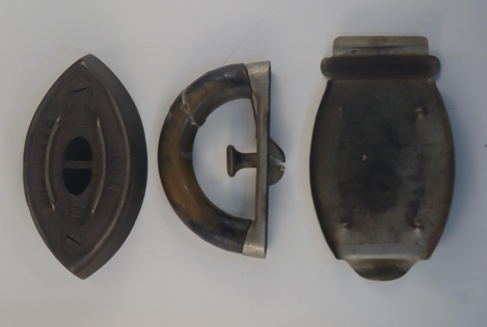 Parts of Mrs Pott's Iron and Stand
