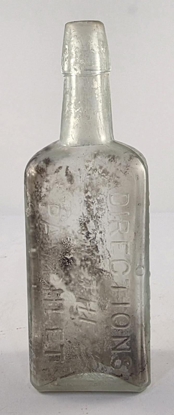 Back view of Hair Tonic Bottle