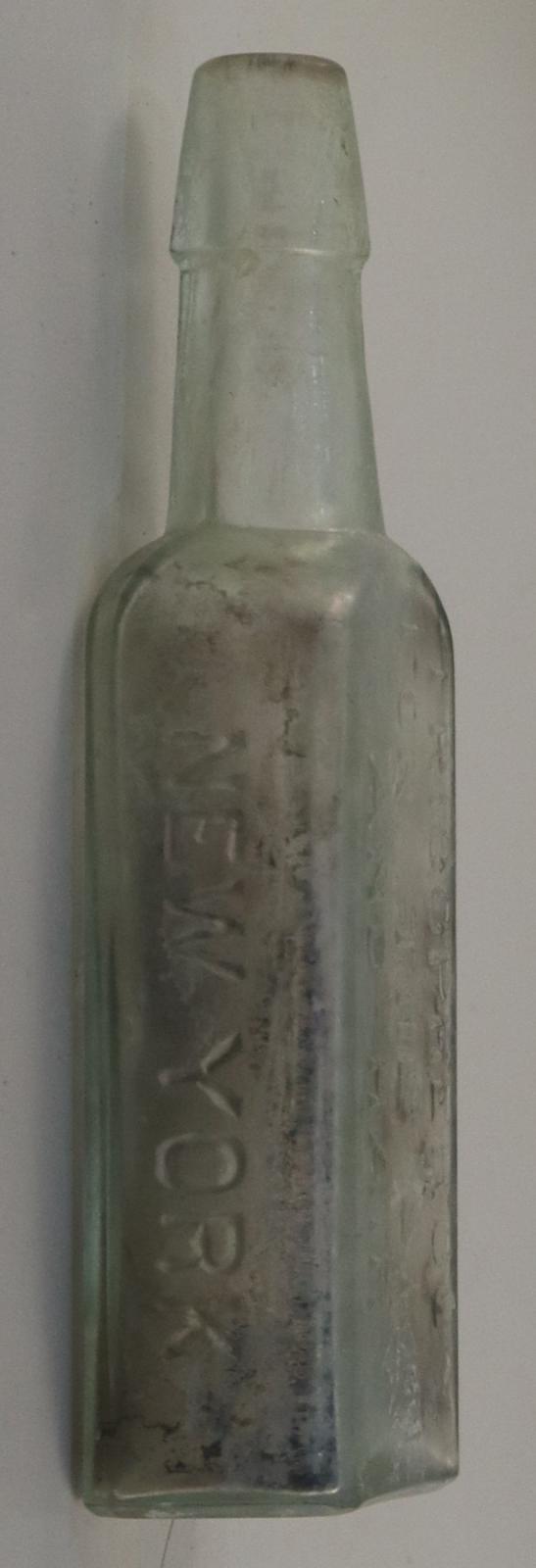 Left side view of Hair Tonic Bottle