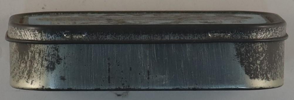 Side view of Tobacco Tin