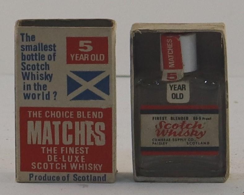 View of Matchbox and Whisky Bottle