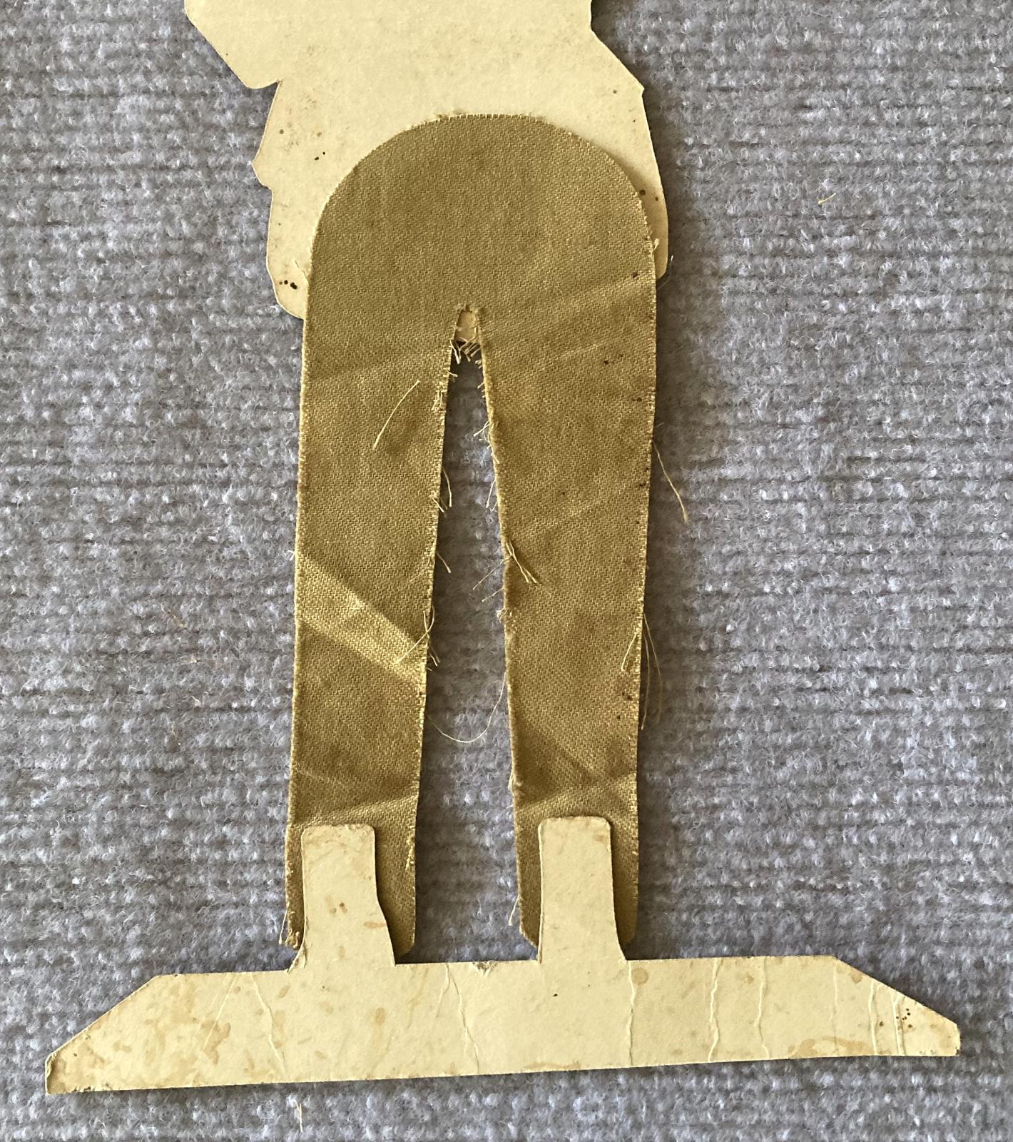  Close-up of bottom half of reverse of WWI era paper doll of British Army Officer 