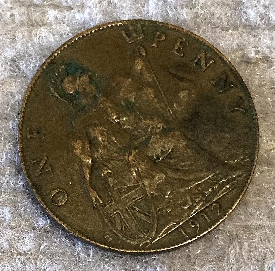 Angled view of reverse of WWI identity disc made from a coin for John Stephen Shimmin