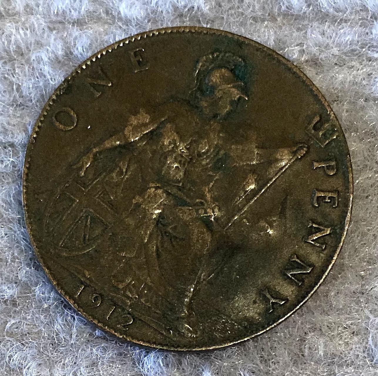 Other angled view of reverse of WWI identity disc made from a coin for John Stephen Shimmin