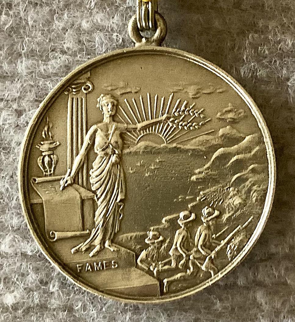Close-up of other side of Welcome Home presentation medal from the Citizens of Lidcombe