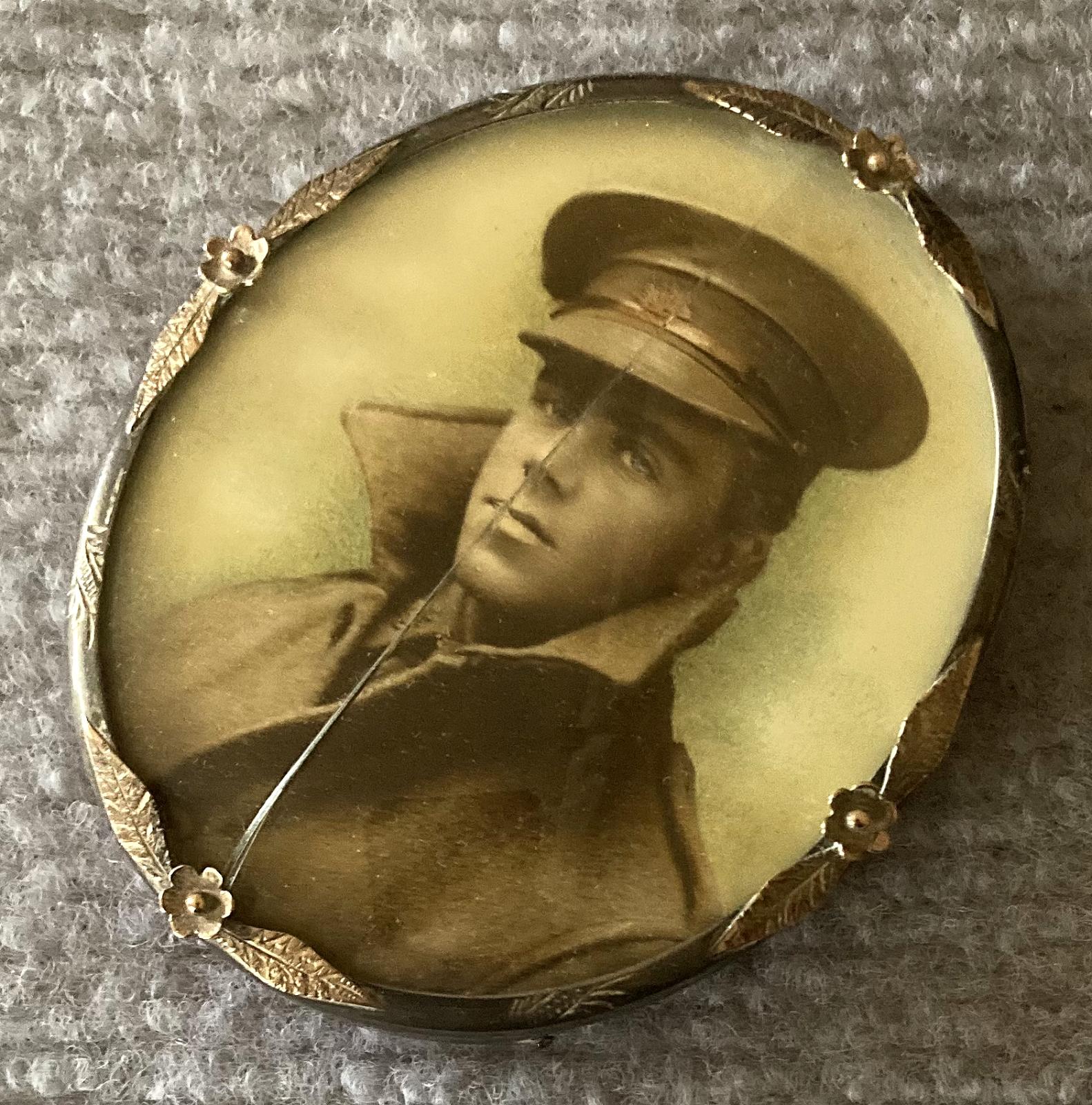 Other angled view of miniature hand tinted portrait of WWI Australian soldier in silver and gold frame