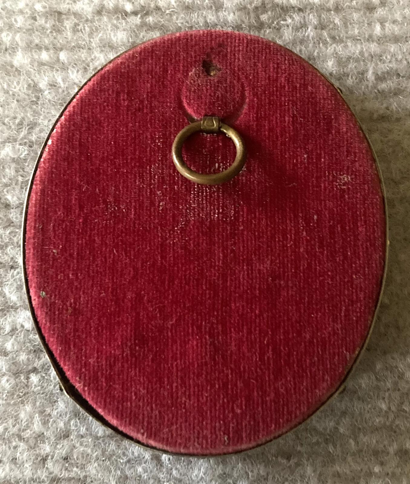 Reverse of miniature hand tinted portrait of WWI Australian soldier in silver and gold frame