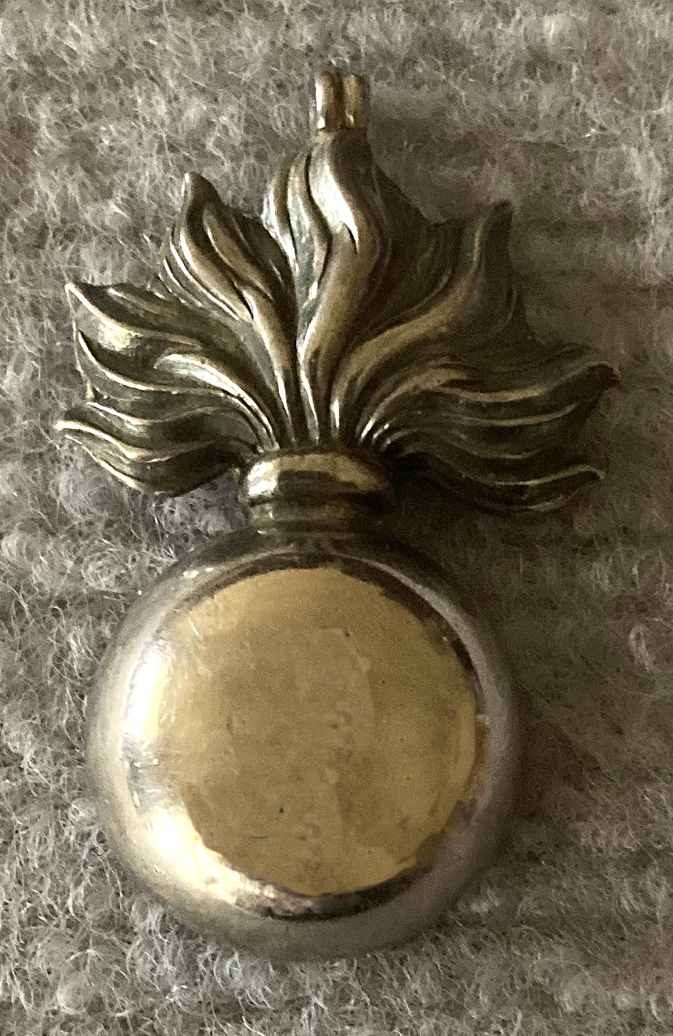 Reverse of sterling silver pendant or fob named to Lieutenant T. Walker, 1915