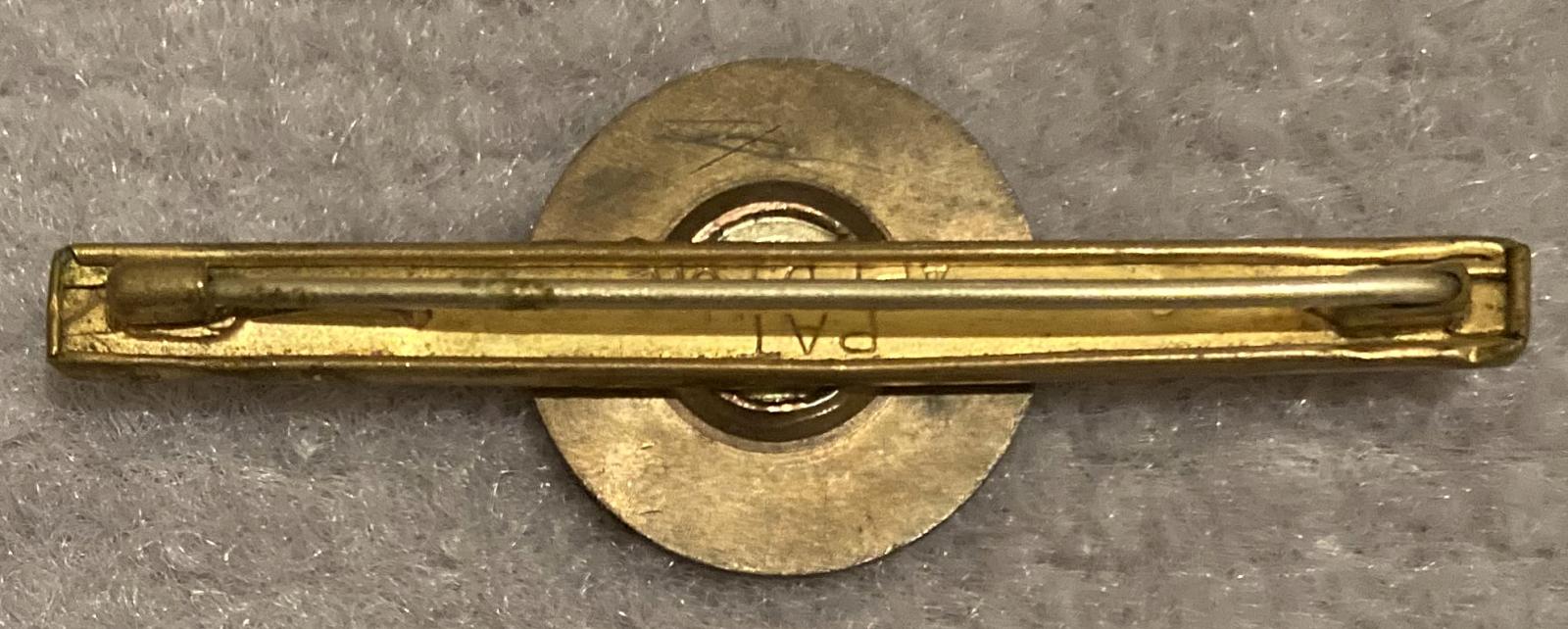 Reverse of 'Lest we forget ANZAC' tie or lapel pin