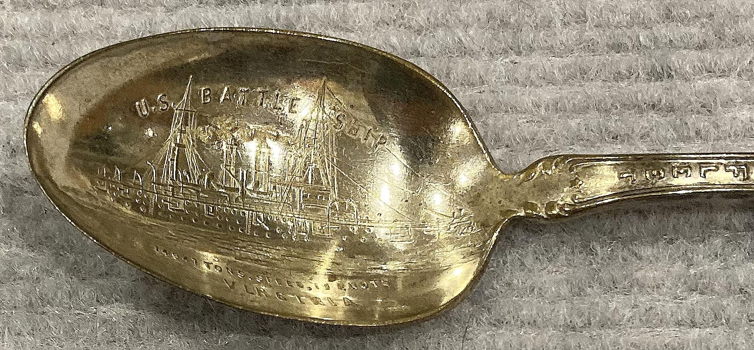 Close-up of spoon bowl showing U.S. Battleship Virginia