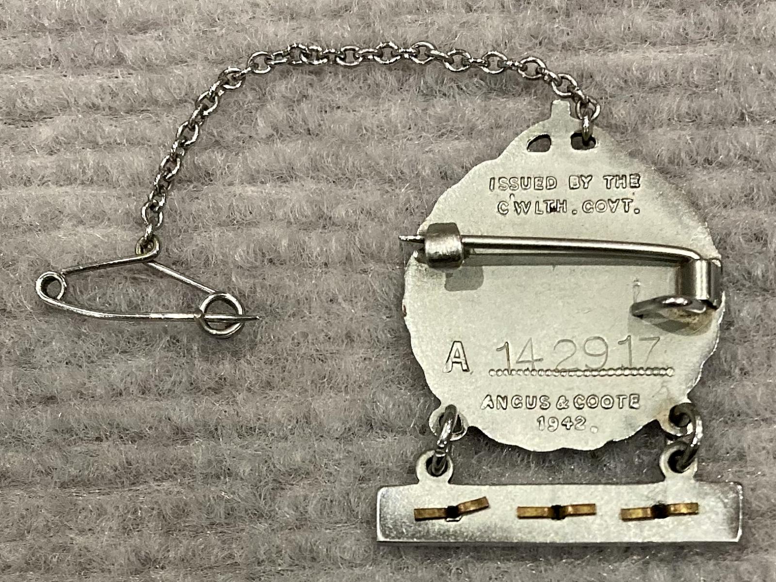 Reverse of WWII Female Relative's Badge issued to Edith May Chalklen