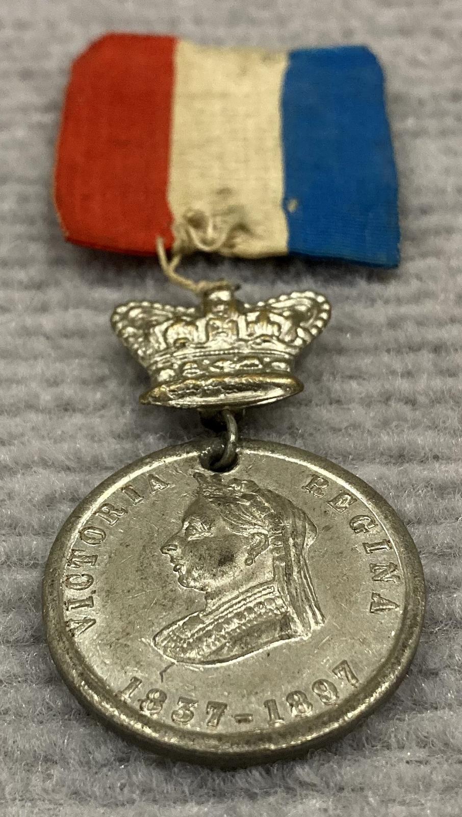 Oblique view of 1897 Queen Victoria Diamond Jubilee medallion