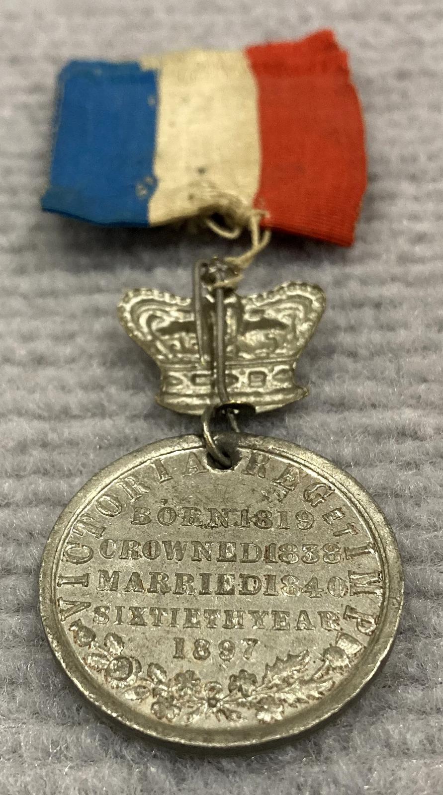 Oblique view of reverse of 1897 Queen Victoria Diamond Jubilee medallion
