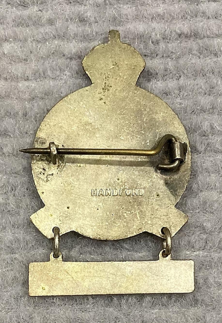 Reverse of First Aid qualification badge, National Emergency Services (N.E.S.) New South Wales 