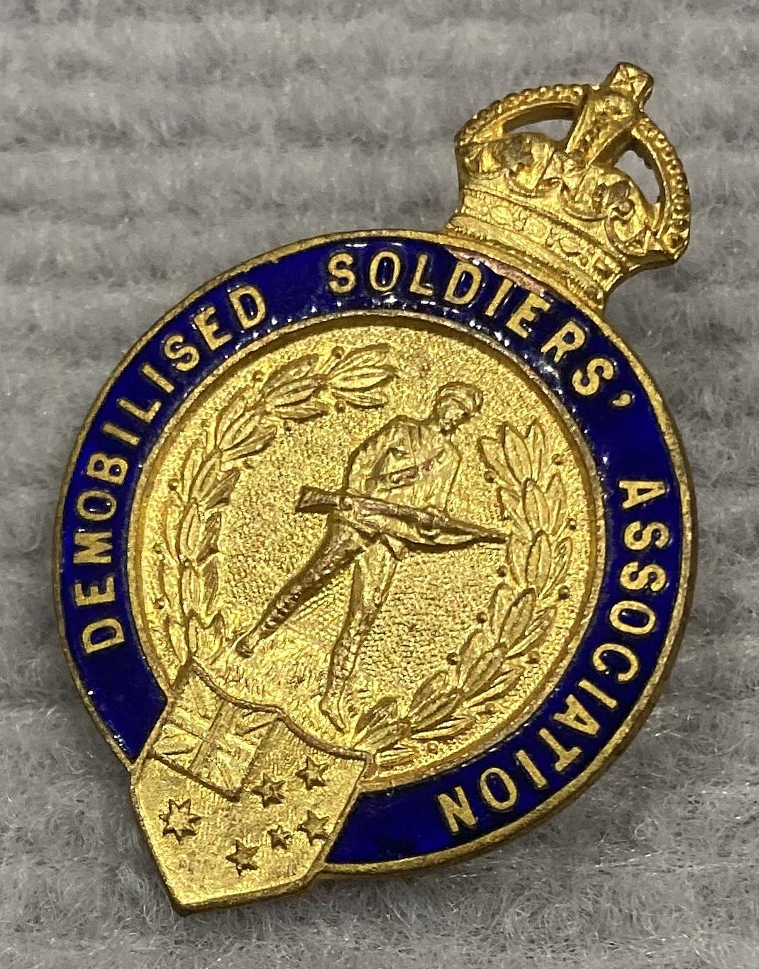 Angled view of WWI era Demobilised Soldiers' Association member's lapel badge