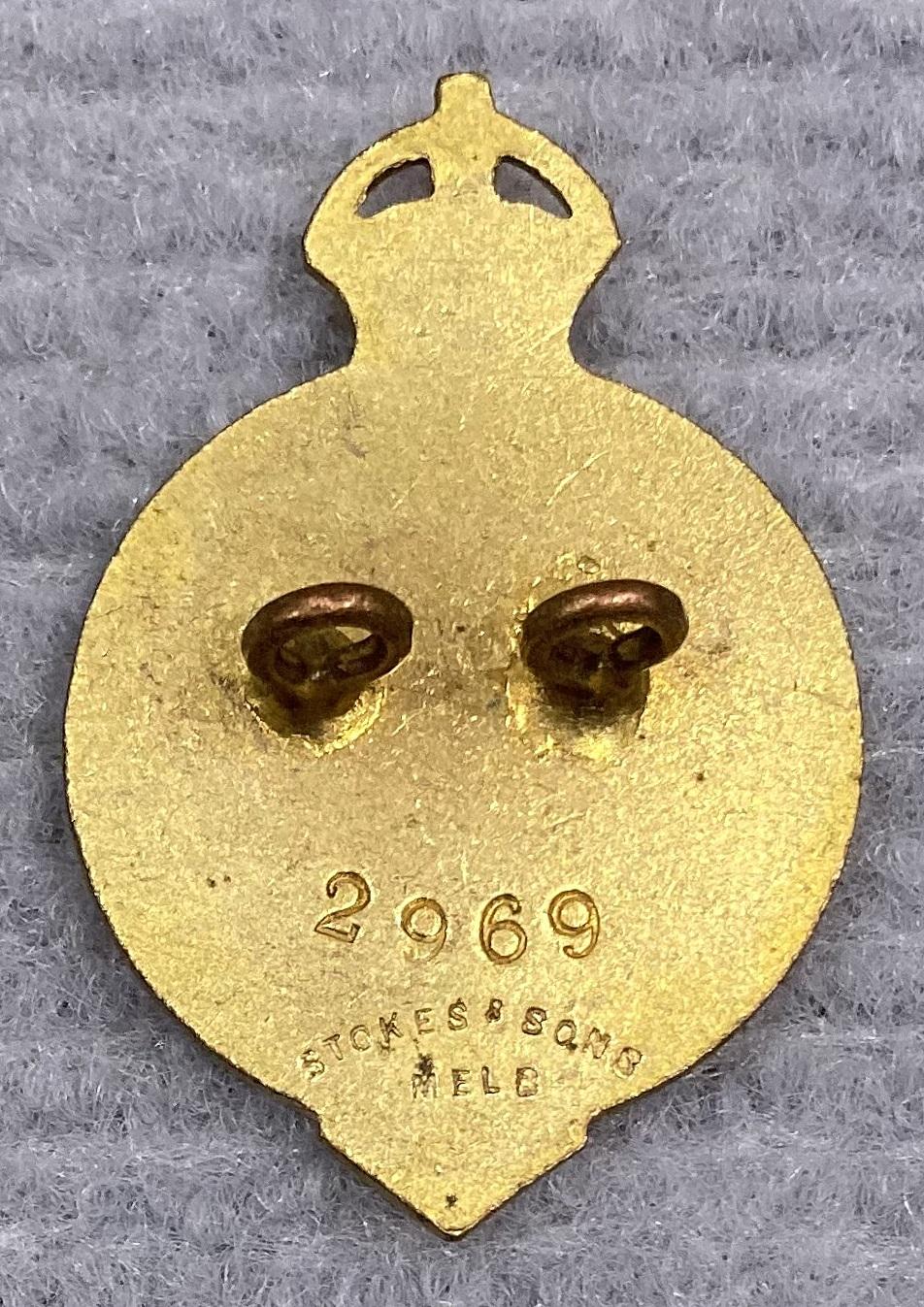 Reverse of WWI era Demobilised Soldiers' Association member's lapel badge