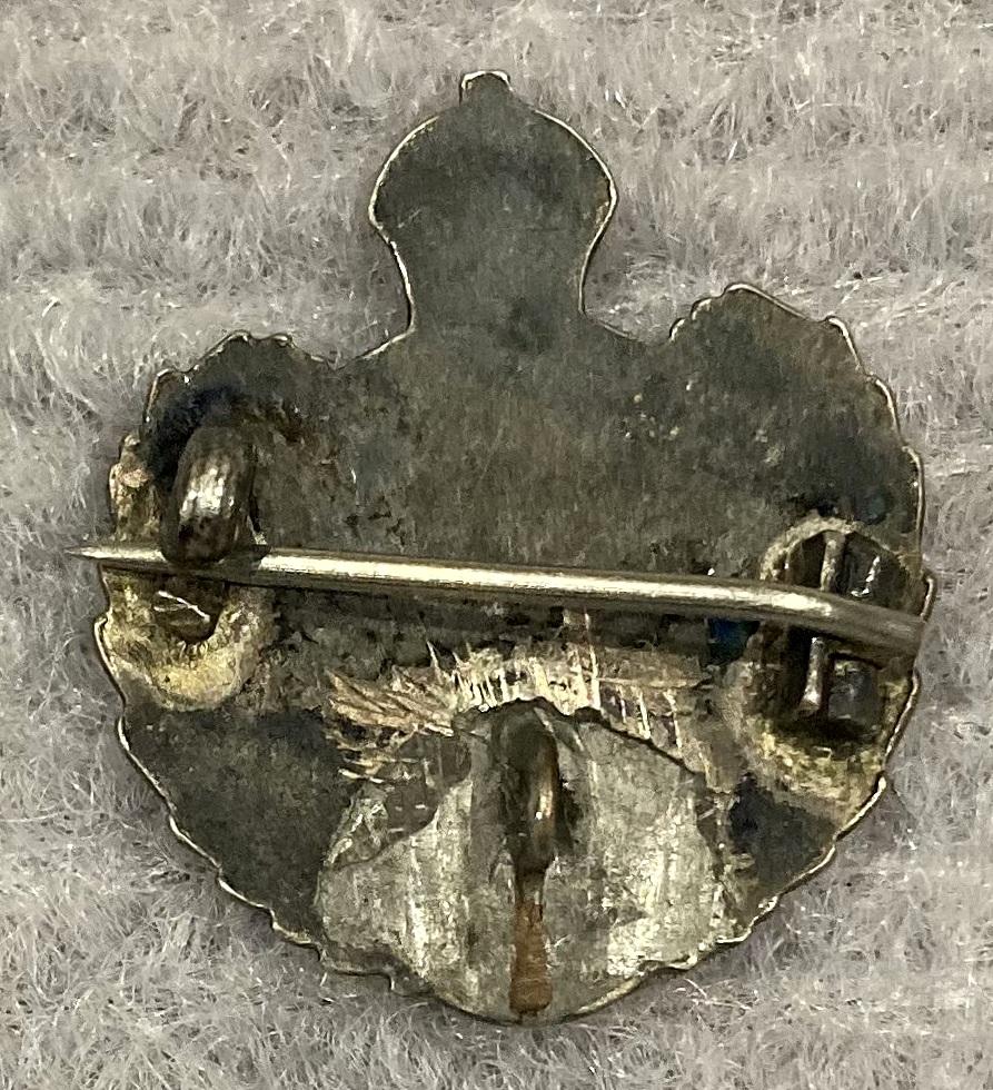 Reverse of Royal Engineers engraved metal sweetheart brooch