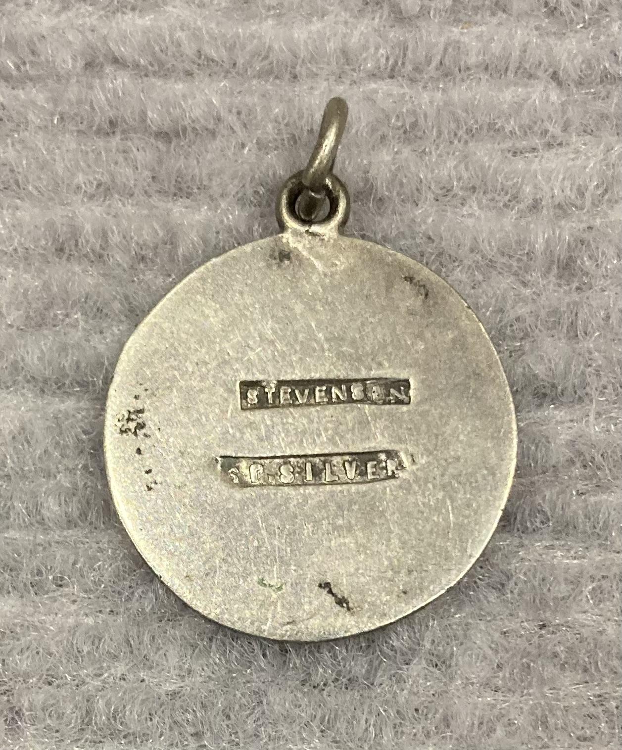 Reverse of silver Peace medallion featuring dove carrying olive branch - 1919