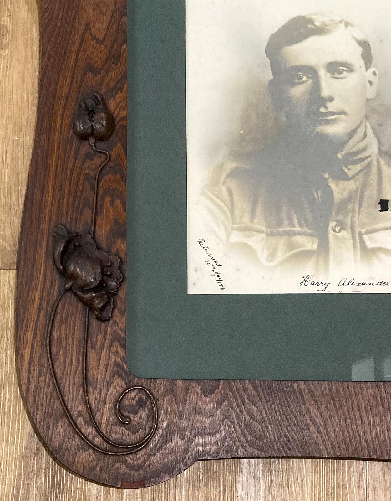 Close-up of decorative timber work on Art Nouveau frame
