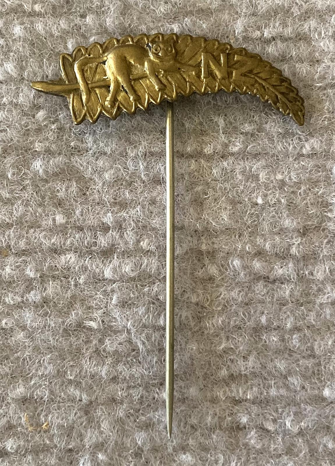 WWI era NZ silver fern sweetheart pin with 'cat' motif