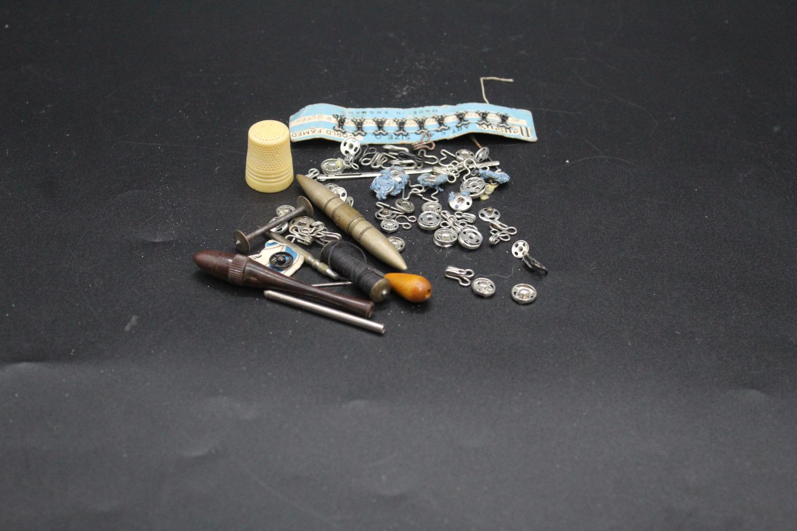 A collection of various sewing tools.