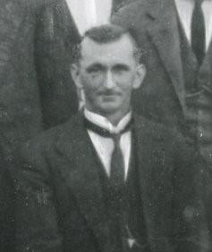 A shoulder level shot of Dr Caleb Joyce.