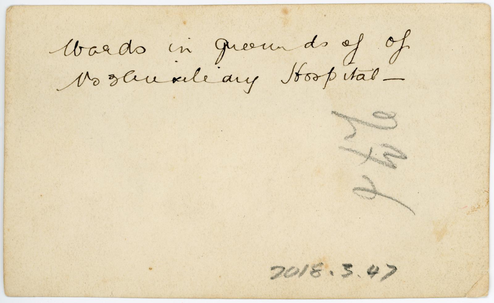 Rear view showing inscription.
