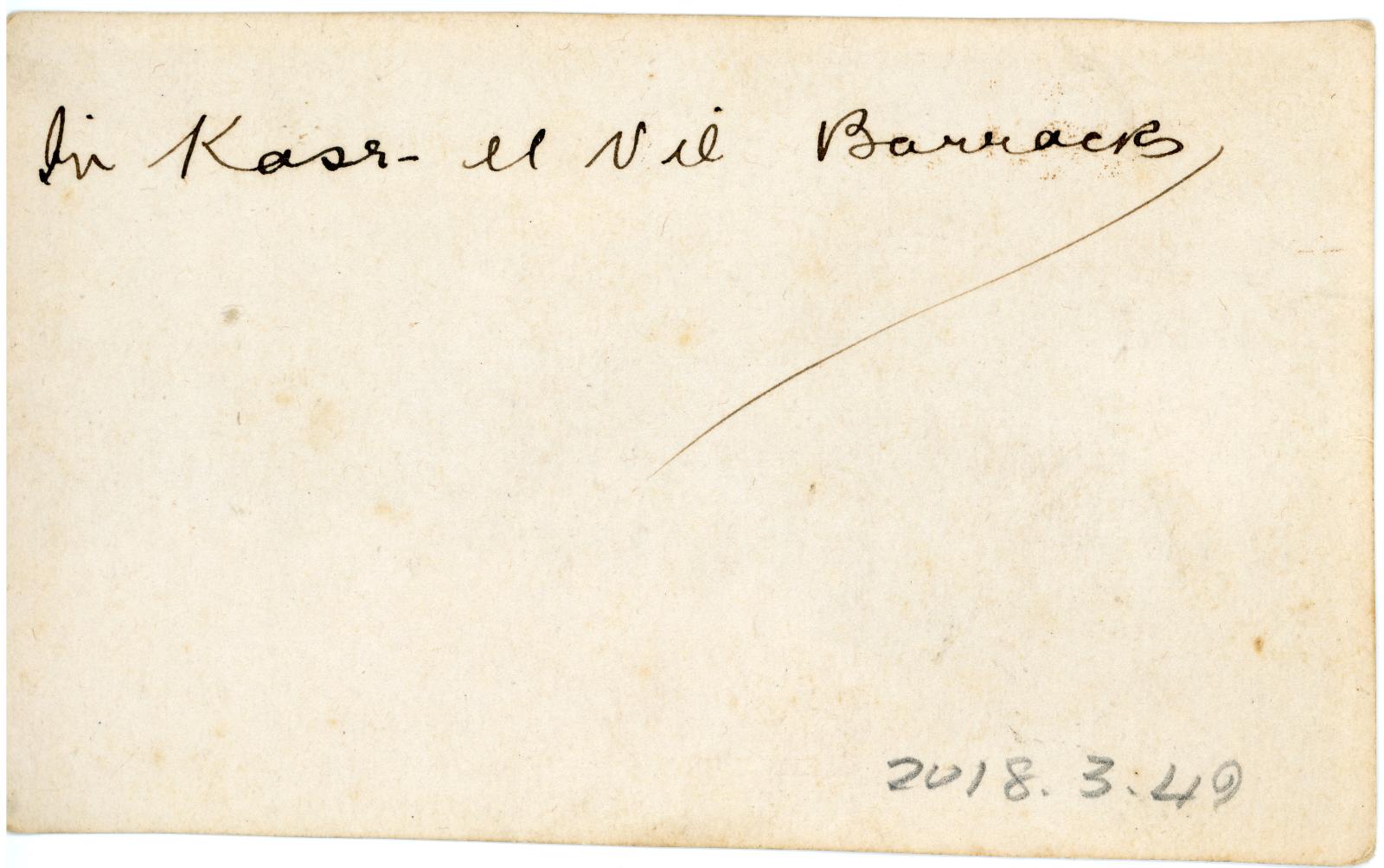 Rear view showing inscription.