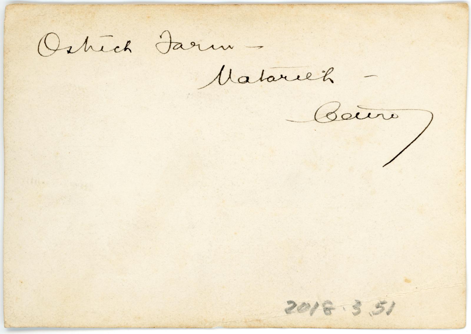 Rear view showing inscription.