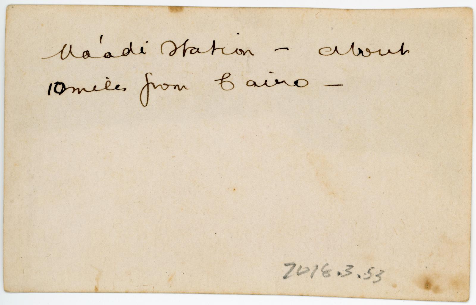 Rear view showing inscription.