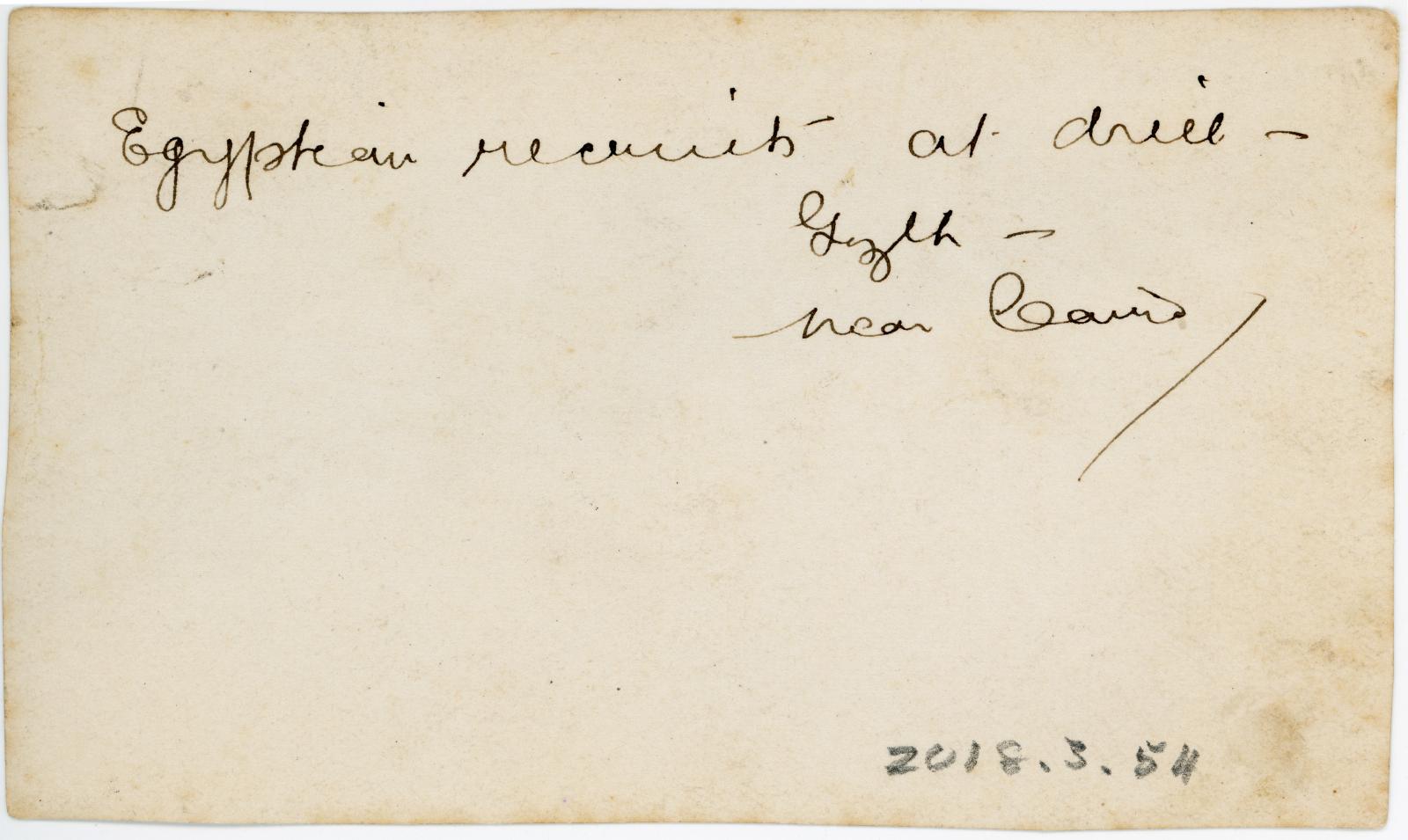 Rear view showing inscription.