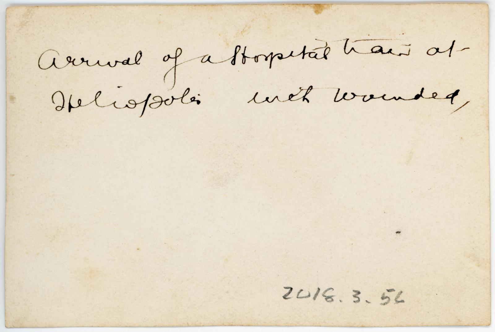 Rear view showing inscription.
