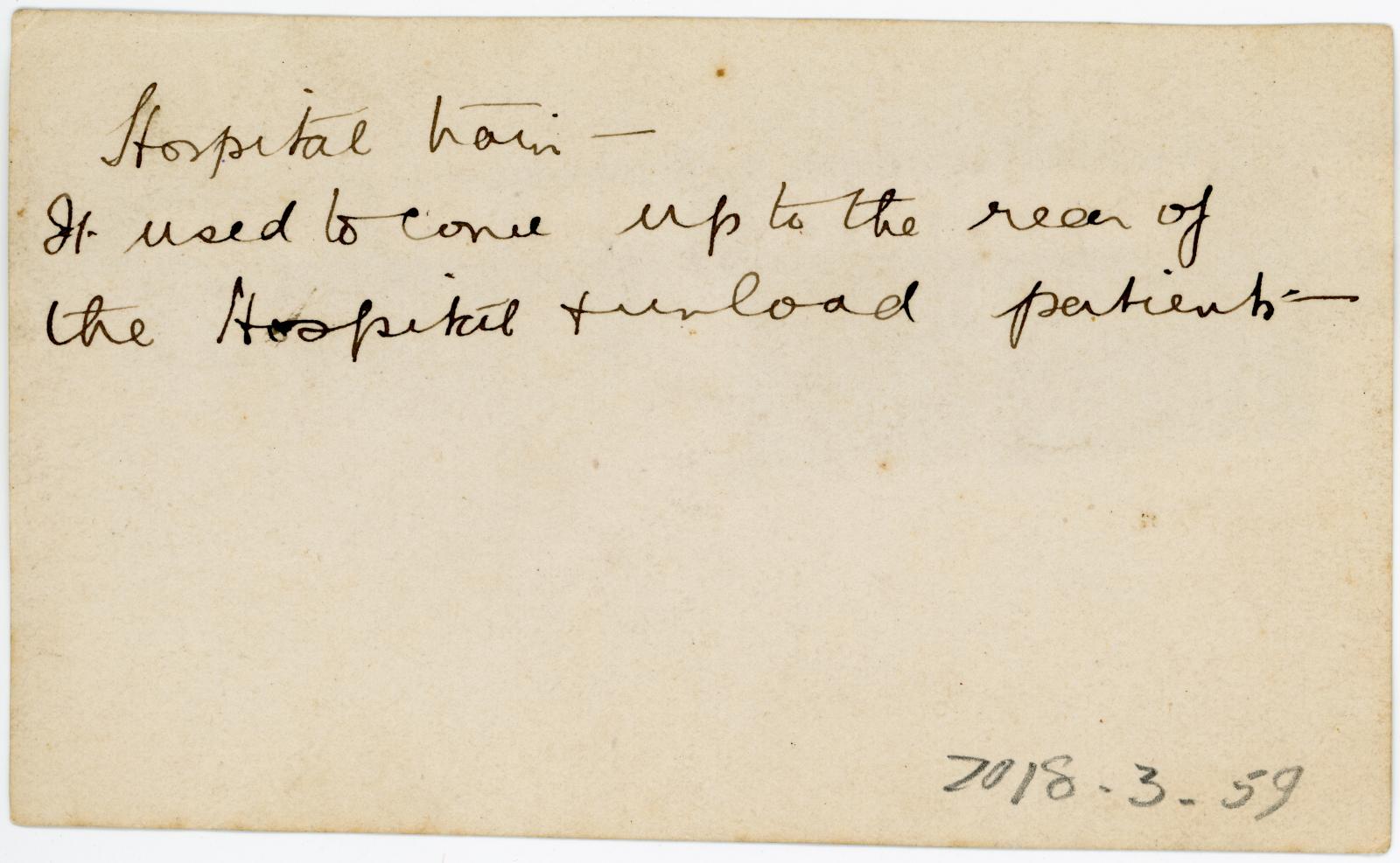Rear view showing inscription.