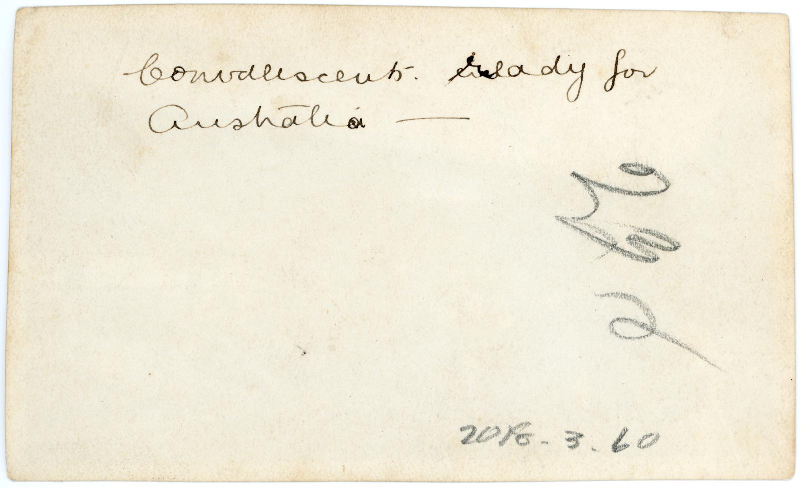 Rear view showing inscription.