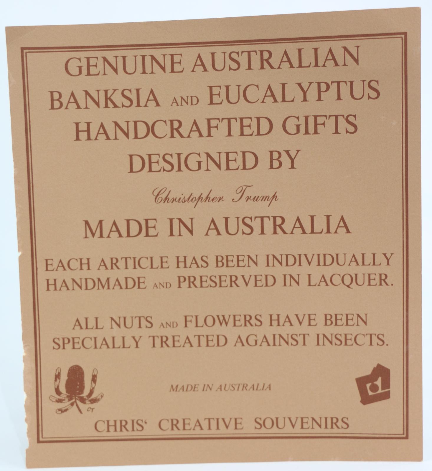 A square light brown card with darker brown text, a small image of a plant and the symbol of made in WA logo at the bottom on the left and right.