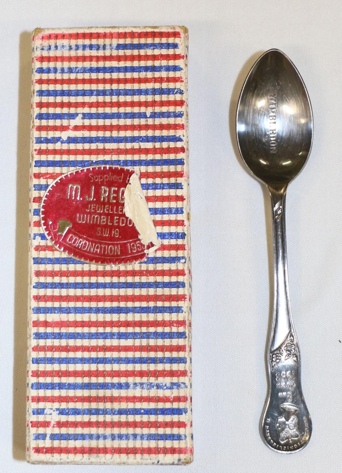 Coronation spoon next to red, white and blue spoon box.