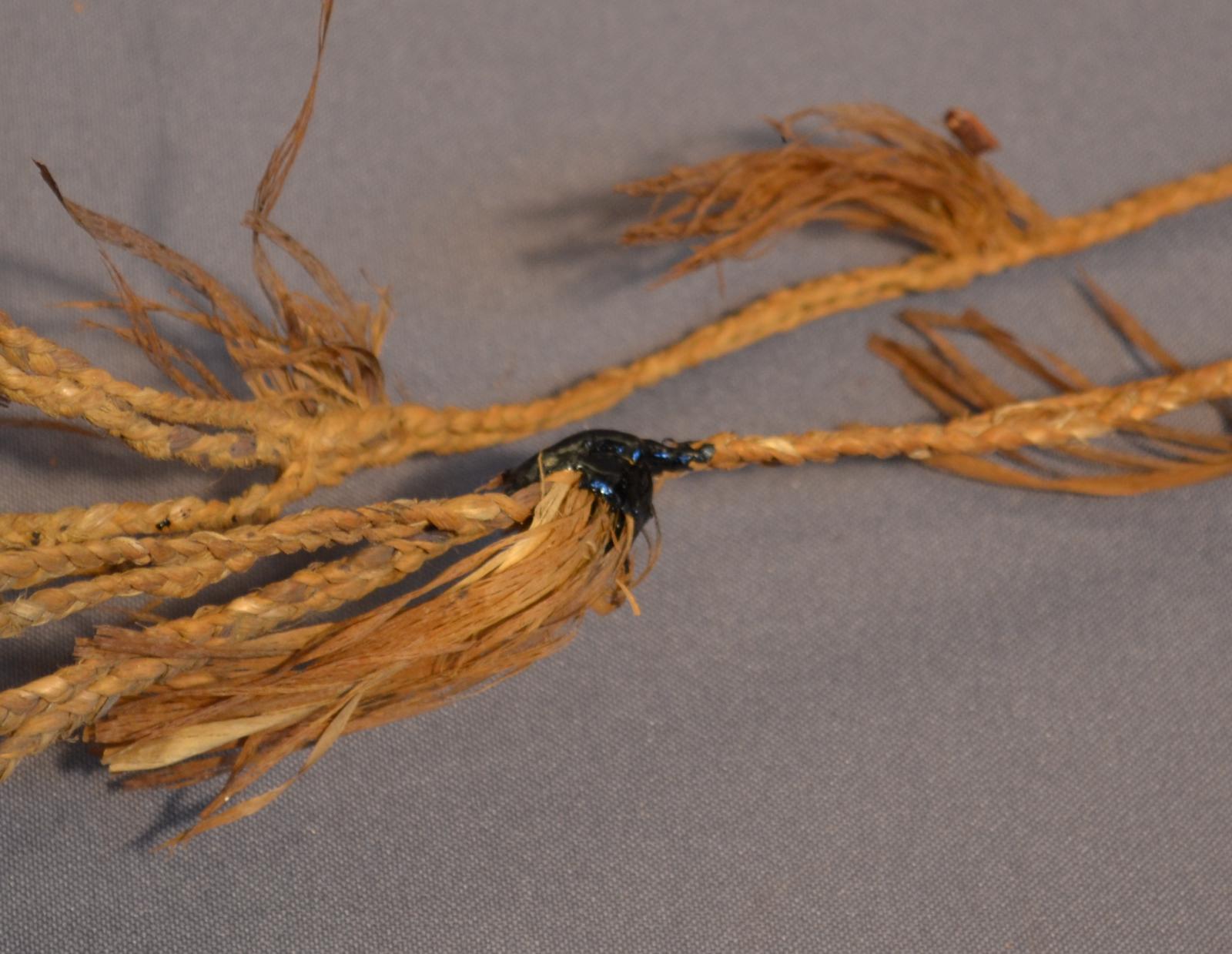 A minor repair on the baskets strap or carrying handle.