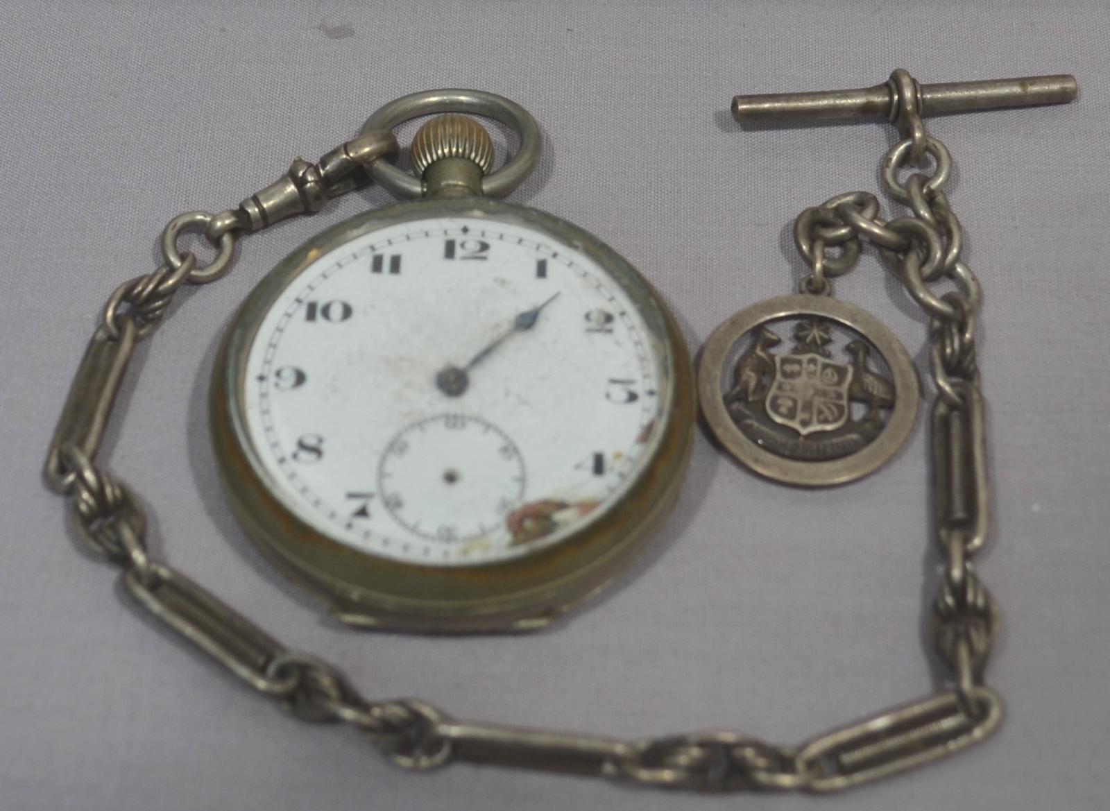 Silver pocket watch and chain with medal showing a Kangaroo and Emu either side of a Shield (The Australian Coat of Arms above a banner reading "Advance Australia".