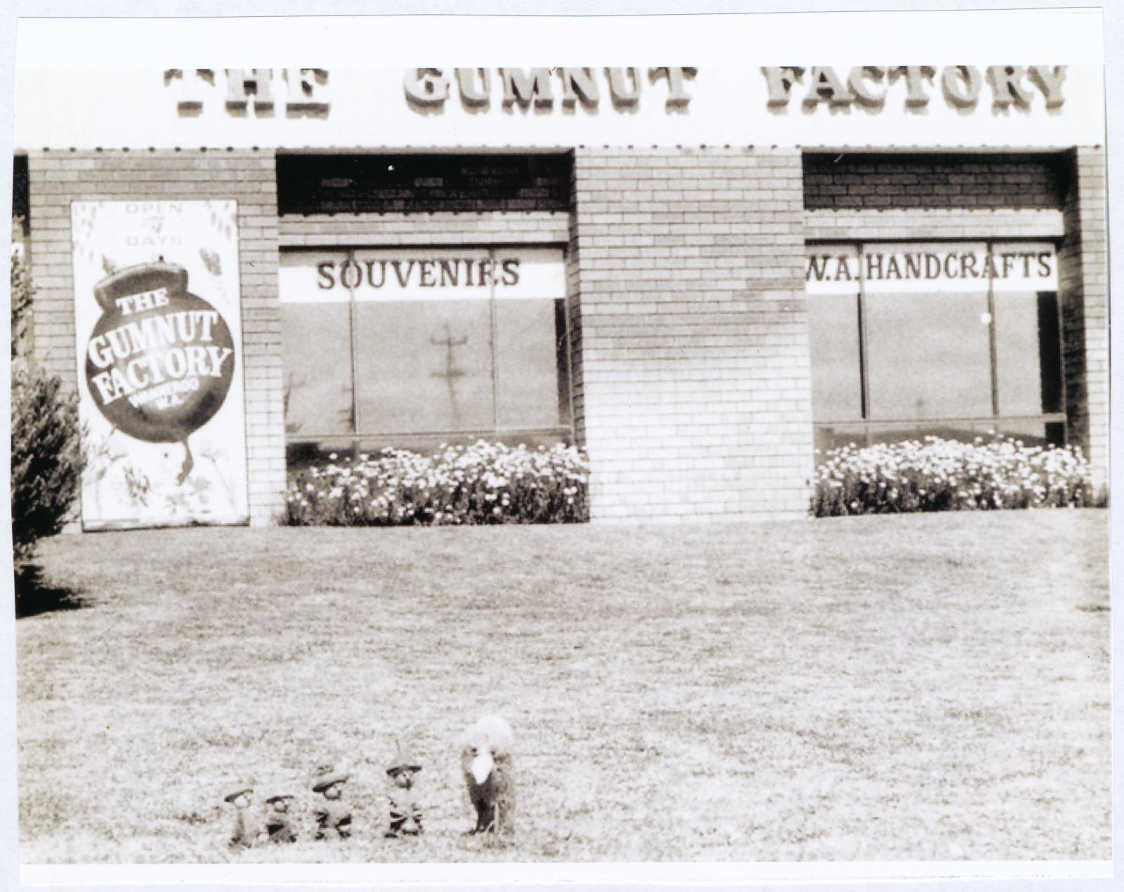 Gumnut figures standing outside Gumnut Factory.