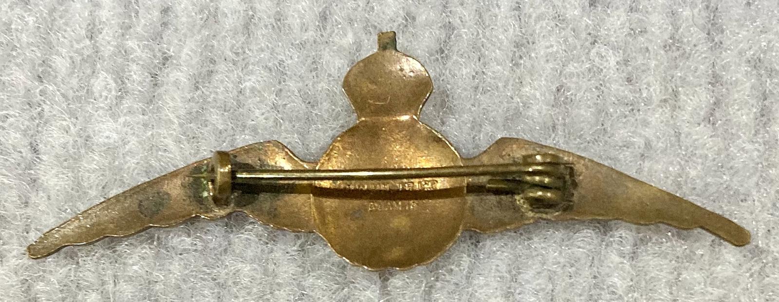 Reverse of Royal Air Force gold tone and enamel sweetheart brooch - 3 - pin closed