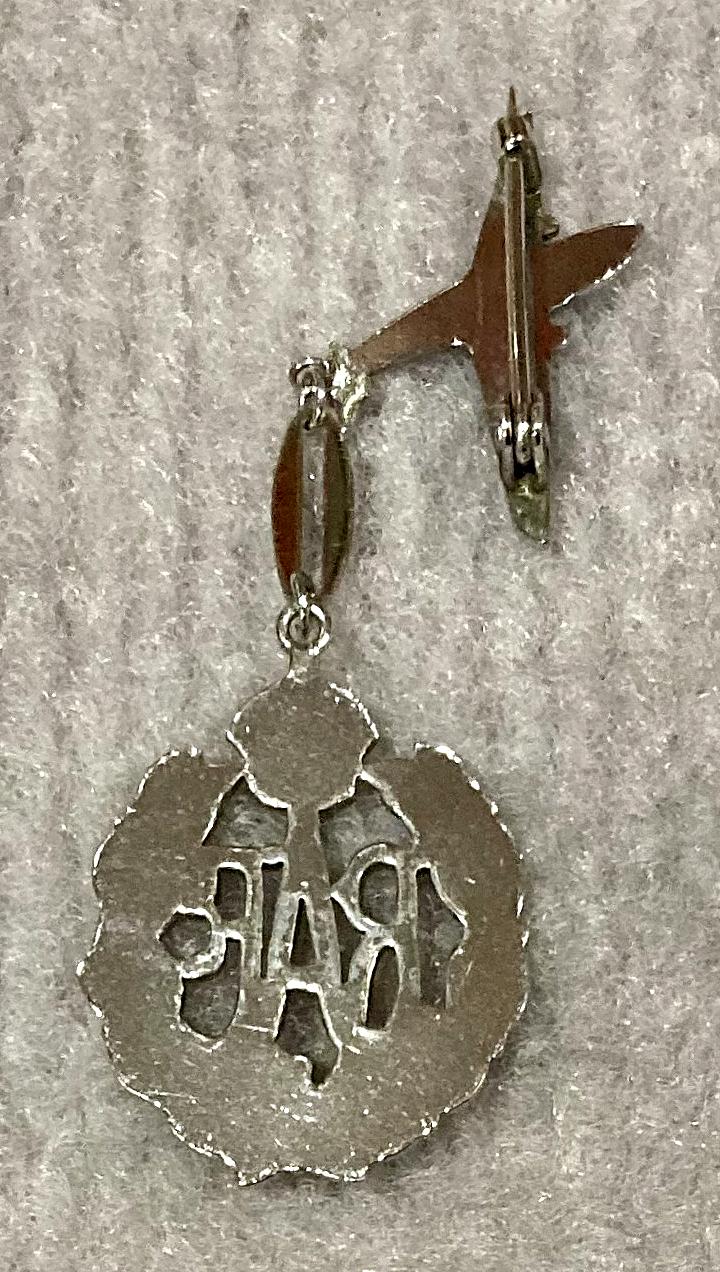 Reverse of Royal Air Force silver tone sweetheart brooch in form of wreath suspended from plane