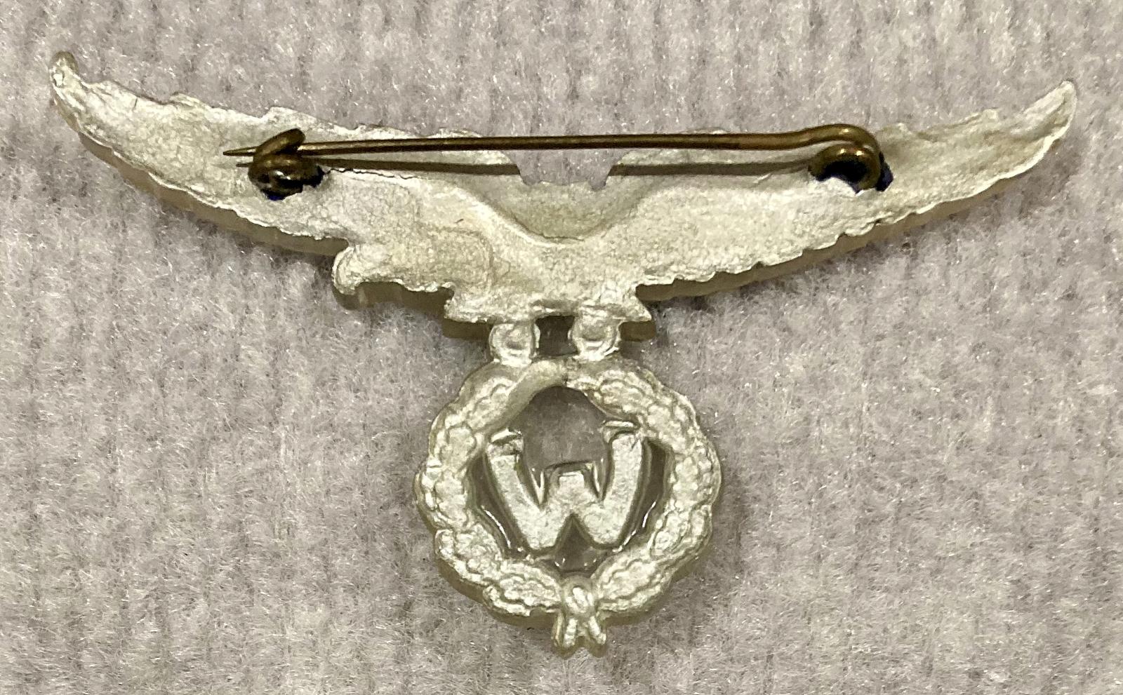 Reverse of Koninklijk Nederlandsch-Indisch Leger (Royal Netherlands East Indies Army Air Force) Perspex sweetheart brooch