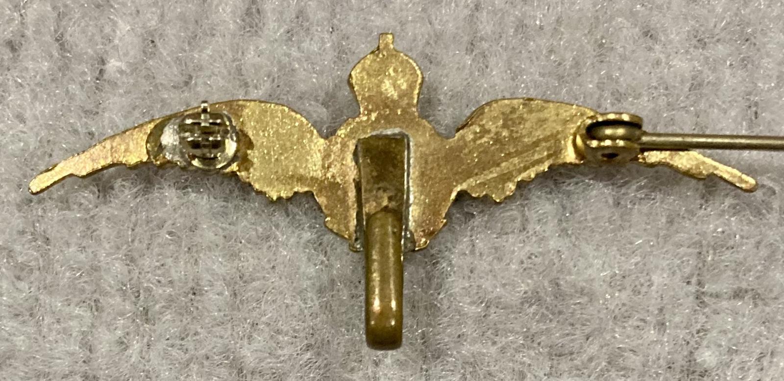 Reverse of Royal Canadian Air Force gold tone sweetheart brooch with hanging loop -  pin open